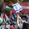 Photo: Veronica Gelfman waves Israeli and American flags 