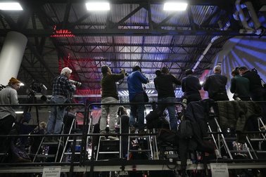 Journalists line the press stand before Republican presidential candidate former President Donald Trump speaks at a caucus night party in Des Moines, Iowa, Jan. 15, 2024. 
