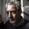 Photo: Writer Paul Auster poses at his home in the Brookl