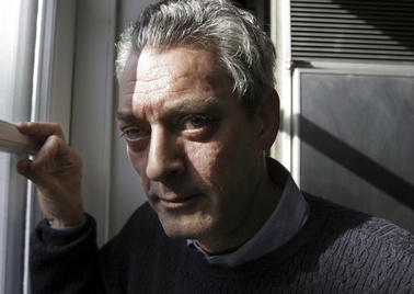 Writer Paul Auster poses at his home in the Brooklyn borough of New York, Jan. 19, 2006.