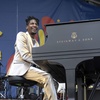 Photo: Jon Batiste performs during the New Orleans Jazz &