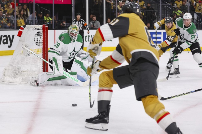 Vegas Golden Knights right wing Mark Stone (61) takes a shot at Dallas Stars goaltender Jake Oettinger (29) during the first period of Game 6 of an NHL hockey Stanley Cup first-round playoff series at T-Mobile arena Friday, May 3, 2024.