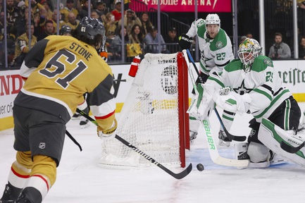 Vegas Golden Knights right wing Mark Stone (61) takes a shot at Dallas Stars goaltender Jake Oettinger (29) during the first period of Game 6 of an NHL hockey Stanley Cup first-round playoff series at T-Mobile arena Friday, May 3, 2024.