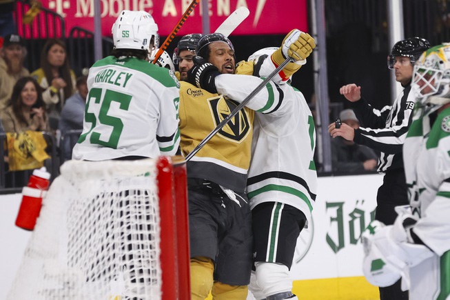 Vegas Golden Knights right wing Keegan Kolesar (55) gets in a fight with Dallas Stars center Sam Steel (18) during the first period of Game 6 of an NHL hockey Stanley Cup first-round playoff series at T-Mobile arena Friday, May 3, 2024.