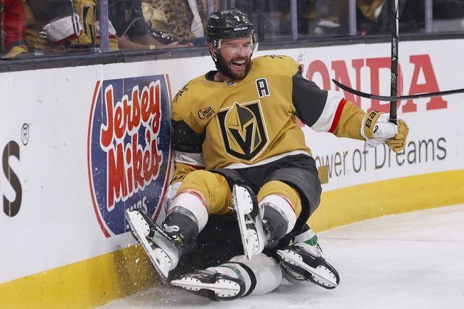 Vegas Golden Knights defenseman Alex Pietrangelo (7) falls on Dallas Stars center Joe Pavelski (16) during the second period of Game 6 of an NHL hockey Stanley Cup first-round playoff series at T-Mobile Arena Friday, May 3, 2024.