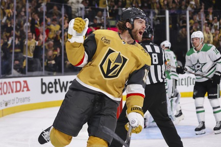 Vegas Golden Knights defenseman Noah Hanifin (15) celebrates after scoring against Dallas Stars goaltender Jake Oettinger (29) during the third period of Game 6 of an NHL hockey Stanley Cup first-round playoff series at T-Mobile Arena Friday, May 3, 2024.