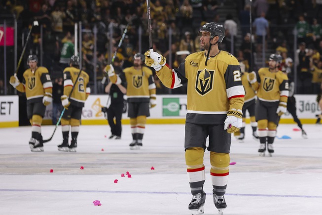 Vegas Golden Knights defenseman Alec Martinez (23) acknowledges fans after his team defeats the Dallas Stars, 2-0, during the third period of Game 6 of an NHL hockey Stanley Cup first-round playoff series at T-Mobile Arena Friday, May 3, 2024.