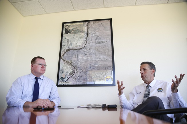 Bullhead City manager Toby Cotter, left, and mayor Steve D’Amico speak during an interview about a new bridge that connects Laughlin, Nevada to Bullhead City, Arizona Tuesday, April 30, 2024. The bridge is scheduled to open June 7 of this year.