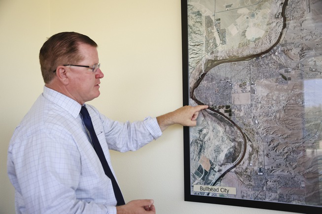 Bullhead City manager Toby Cotter shows another proposed location on the Colorado River for a bridge that connects Laughlin, Nevada to Bullhead City, Arizona Tuesday, April 30, 2024. The bridge is scheduled to open June 7 of this year.