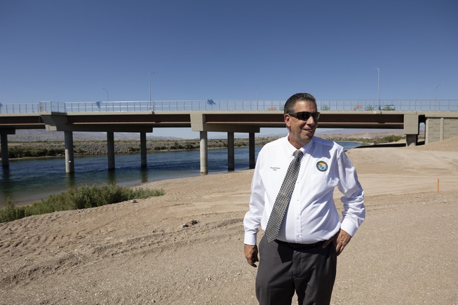 Bullhead City Mayor Steve D’Amico stands in front of a new bridge in Bullhead City, Arizona that spans the Colorado River and connects to Laughlin, Nevada Tuesday, April 30, 2024. The bridge is scheduled to open June 7 of this year.