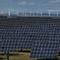 Photo: Solar panels work near the small town of Milagro, 