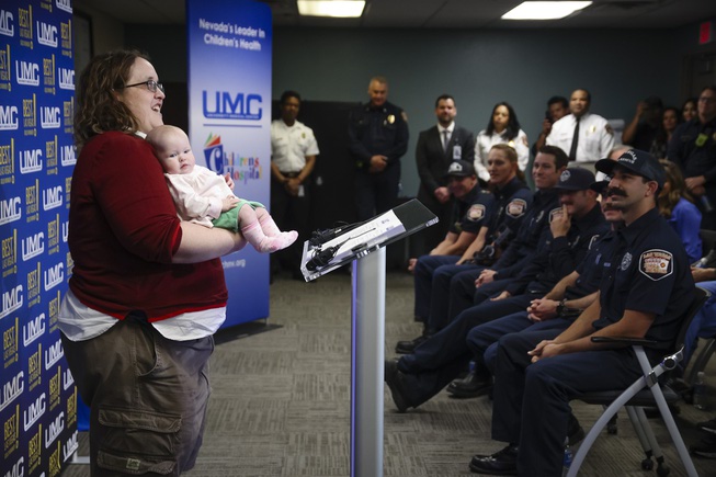 Jesica Spellacy holds her three-month-old daughter Johanna Spellacy during a press conference at the UMC Trauma Center Tuesday, May 7, 2024. Johanna’s life was saved on Feb. 7 when Las Vegas Fire & Rescue paramedics relieved constriction to her umbilical cord when she wasn’t getting enough oxygen during a breech birth.