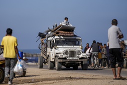 Displaced Palestinians arrive in central Gaza after fleeing from the southern Gaza city of Rafah in Deir al Balah, Gaza Strip, on Wednesday, May 7, 2024.