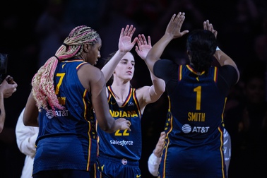 Indiana Fever guard Caitlin Clark (22) is introduced before the team's preseason WNBA basketball game against the Atlanta Dream in Indianapolis, Thursday, May 9, 2024. 

