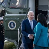 President Joe Biden is greeted by Mayor London Breed as he walks from Marine One in San Francisco, Calif., on Thursday, May 9, 2024. President Biden began a fund-raising swing through California and Washington on Friday, courting an elite subset of donors in a string of campaign events hosted by wealthy backers. 