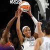 Las Vegas Aces center A'ja Wilson (22) grabs a loose ball during the first half of an WNBA basketball game against the Phoenix Mercury at Michelob Ultra Arena in Mandalay Bay Tuesday, May 14, 2024.