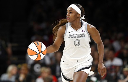 Las Vegas Aces guard Jackie Young (0) takes the ball upcourt during the second half of an WNBA basketball game against the Phoenix Mercury at Michelob Ultra Arena in Mandalay Bay Tuesday, May 14, 2024.