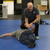 Instructor Dave Rose demonstrates a prone handcuffing position on a student during an Arrest & Control Instructor course in Sacramento, Calif., on Thursday, Jan. 18, 2024. Rose has trained generations of officers that prone restraint is safe. His pupils are instructors who take his training back to their departments.


