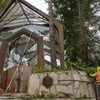 Urban forestry workers remove branches from a redwood tree as they prepare to cut it down next to the Wayfarers Chapel, a sanctuary by architect Lloyd Wright, also known as "The Glass Church," in Rancho Palos Verdes, Calif., Wednesday, May 15, 2024. The modernist chapel features organic architecture with glass walls in a redwood grove overlooking the Pacific Ocean. Part of the Swedenborgian denomination, the church's followers share in 18th-century Swedish scientist and theologian Emanuel Swedenborg's "quest for a religion that interconnects all of life, and for a system that allows reasoned questioning of life's deepest religious issues," the chapel's website says. 

