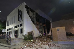 A damaged building is shown in the aftermath of a severe thunderstorm that passed through downtown, Thursday, May 16, 2024, in Houston.