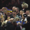 Ukraine's Oleksandr Usyk celebrates after beating Britain's Tyson Fury in their undisputed heavyweight world championship boxing fight at the Kingdom Arena in Riyadh, Saudi Arabia, Sunday, May 19, 2024. 