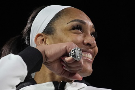 Las Vegas Aces center A'ja Wilson (22) reacts as she wears the 2023 championship ring before a WNBA basketball game Tuesday, May 14, 2024, in Las Vegas.