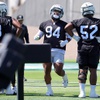 Las Vegas Raiders defensive tackle Christian Wilkins (94) runs a drill during organized team activities at the Las Vegas Raiders Headquarters/Intermountain Health Performance Center in Henderson Tuesday, May 21, 2024.