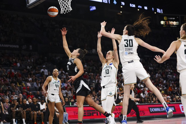 Las Vegas Aces guard Kelsey Plum (10) goes for a lay up during the second half of a WNBA basketball game against New York Liberty Saturday, June 15, 2024, in Las Vegas.