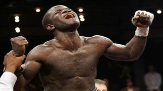 Clottey beats Judah