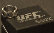 Skeletal Metal provides Rings to All U-F-C 100 Fighters.  Plus Emily Gimmel provides a list of all the post UFC 100 after parties.