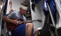 Las Vegas 51s relief pitcher Jonah Bayliss shows off his skills away from the rubber, strumming the old six string.