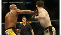 The UFC made its Philadelphia debut Saturday with <a href="/news/sports/ufc/2009/ufc-101/">UFC 101</a>, which saw two headlining fights live up to their billing thanks to a first-round knockout by Anderson Silva and a fourth-round submission by B.J. Penn.