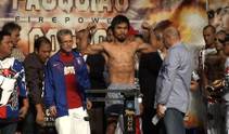 Sights and sounds from the Pacquiao-Cotto weigh-in Friday afternoon at the MGM Grand Garden Arena.