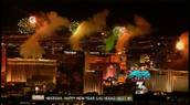 Fireworks glitter above Strip for New Year's