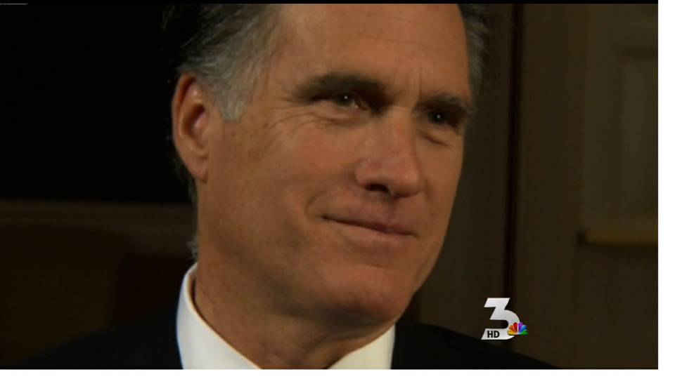 Romney leads pack into caucus
