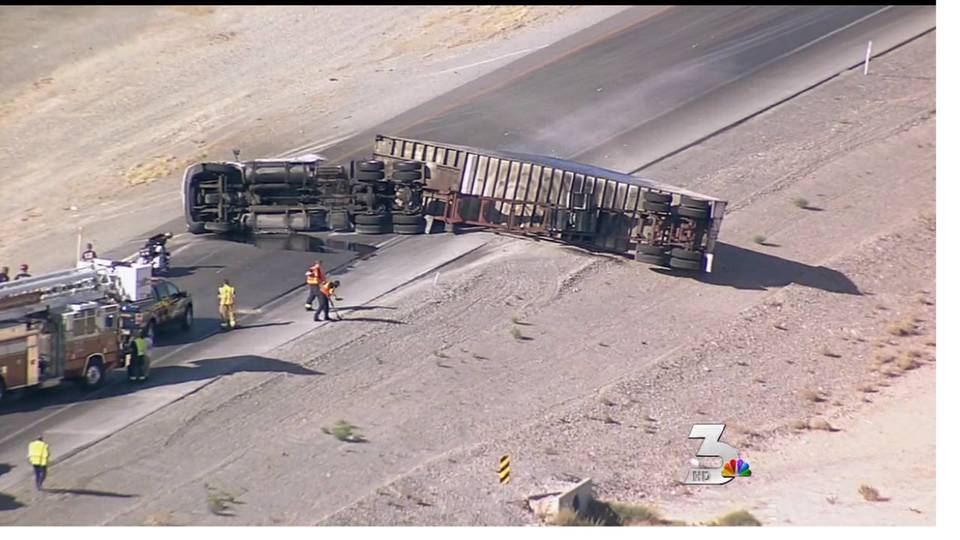 Semi-truck rolls over on I-15
