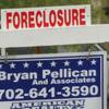 A foreclosed home is shown in a neighborhood near Tenaya Way and Russell Road Thursday, June 25, 2015.