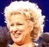 An elevator causes Bette Midler to rise above stage during her "Divine Miss Millennium" tour at the Mandalay Bay Events Center Friday, December 31, 1999. 
