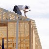Model homes are shown under construction at The Estates at Rhodes Ranch, a Century Communities development, Thursday, Dec. 3, 2015. Project manager Dale Juilfs is at left.