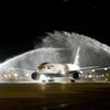 Mexican airline Volaris gets a ceremonial arch of water courtesy of the Clark County Fire Department as it makes its inaugural arrival at McCarran International Airport Wednesday, March 30, 2011.