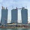 
Construction takes place in July at a hotel tower in the Las Vegas Sands Corp.'s Marina Bay Sands Integrated Resort, scheduled to open early next year in Singapore.