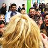 Attendees trade in their old earphones for new ones during CES on Jan. 8 at the Las Vegas Convention Center.
