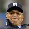 Baseball Hall of Famer Reggie Jackson throws out the ceremonial first pitch before the opening day baseball game between the Toronto Blue Jays and New York Yankees, at Yankee Stadium in New York, Tuesday, April 1, 2008.