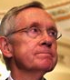 Sen. Harry Reid, right, listens as Transportation Secretary Ray LaHood speaks July 2 at a news conference to designate a high-speed-rail corridor.