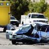 A view of a car after a fatal crash on Flamingo Road near Cambridge/Claymont streets Monday, Aug. 8, 2011. The road was closed in both directions during the investigation.