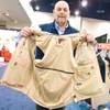 The multi-pocketed Scottevest, which has 24 internal pockets helps the traveler by organizing and hiding various items in an easy to reach vest, Thursday March 8, 2012.