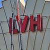 Workers prepare to hang the final letter in the new sign at the LVH casino in Las Vegas on Thursday, July 26, 2012.