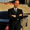 CLS Transportation owner Charles Horky is shown in front of a company car in a Facebook image.