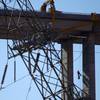 A bridge inspector rappels down a column during a safety inspection of the Mike O'Callaghan-Pat Tillman Memorial Bridge Wednesday, January 16, 2013.