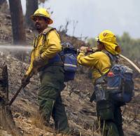 Firefighters have reached 80 percent containment of the nearly 28,000-acre wildfire on Mount Charleston, readying the area for handoff to local authorities later this week.